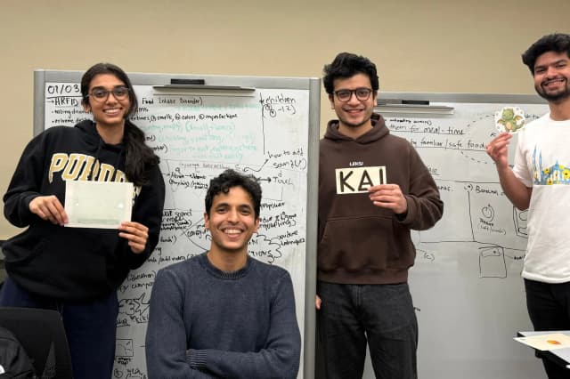 His FigBuild 2026 team in front of their mapped-out idea